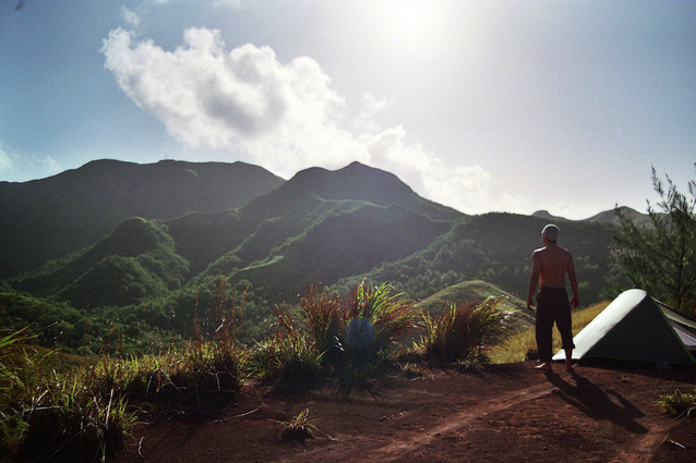 Guam mountains with hiker and tent